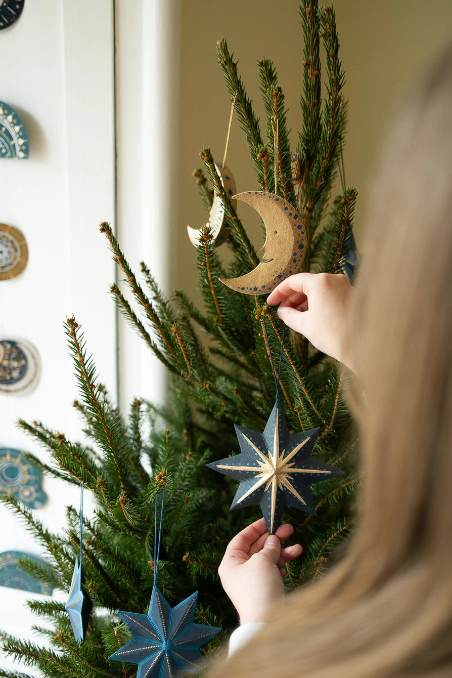 Twinkling Paper Star Christmas Decoration - THE BRISTOL ARTISAN